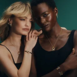 Bold Bonds Interlock Hoop Earrings - Mixed Metal